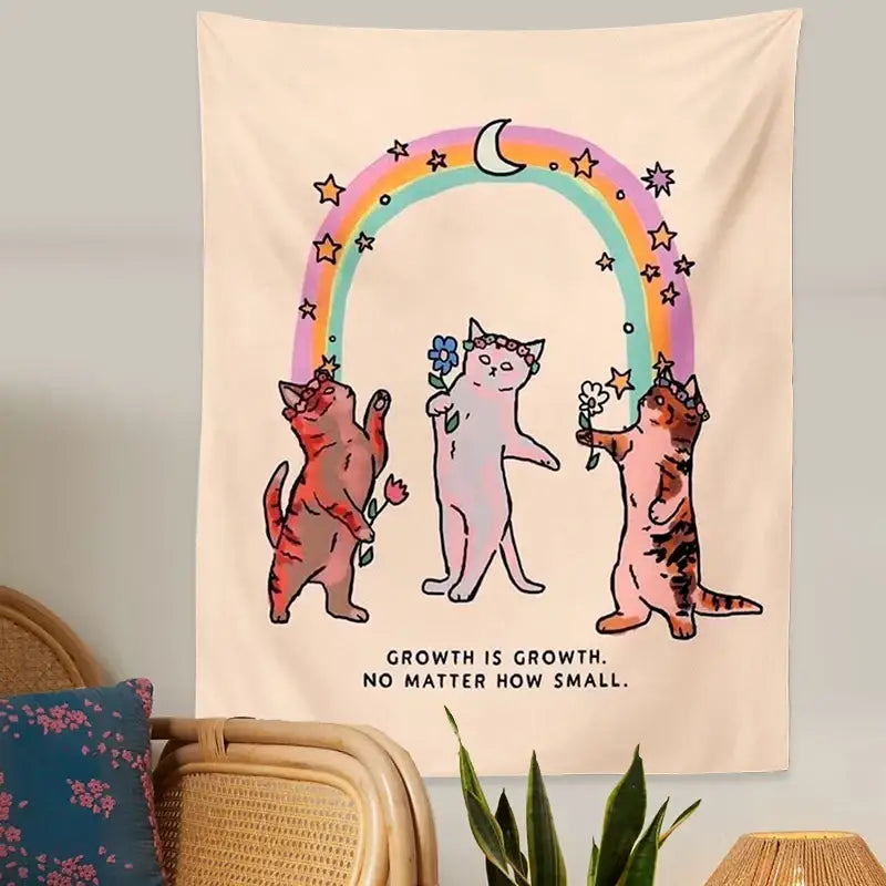 Beige boho cat tapestry wall hanging featuring three illustrated cats with floral crowns and rainbow arch decorbites cat tapestry
