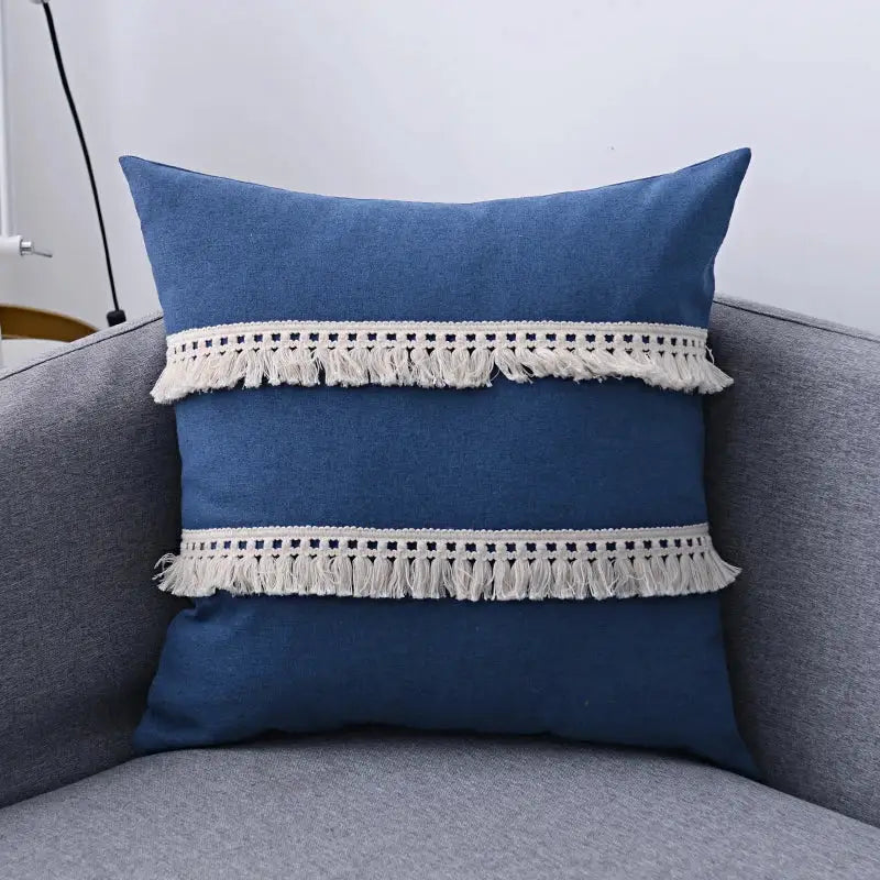 Blue denim pillow cover with two horizontal cream fringe bands in boho beige linen tassel pillow cover set
