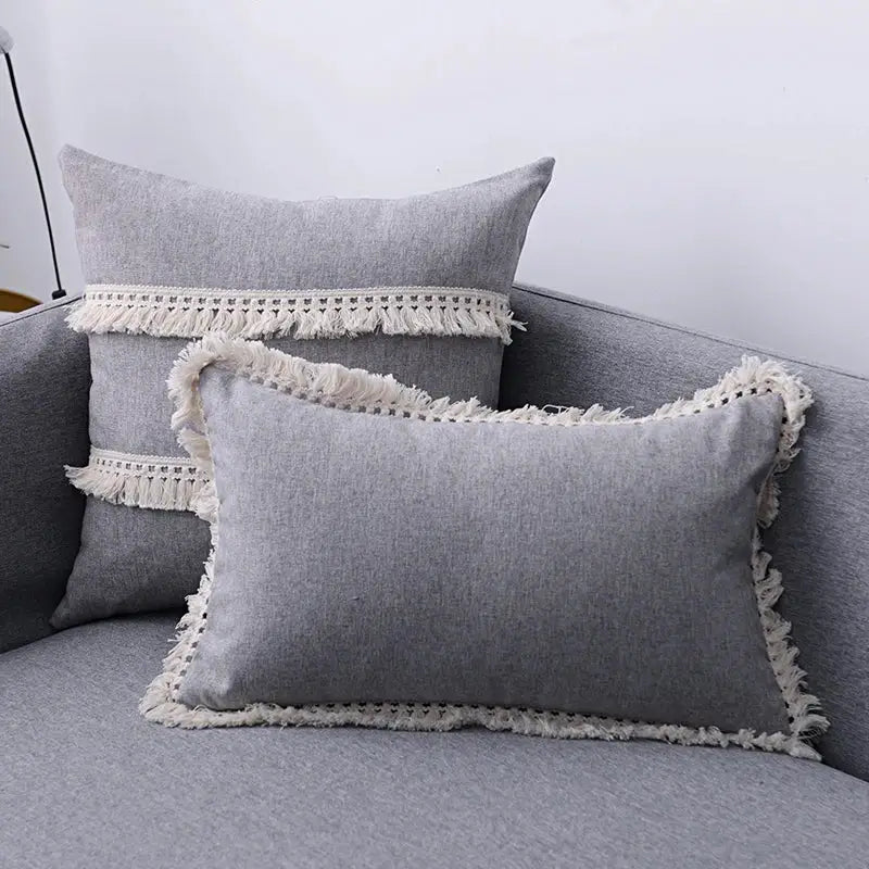 Gray rectangular linen throw pillow cover set with cream fringe detailing for boho living room sofa decor