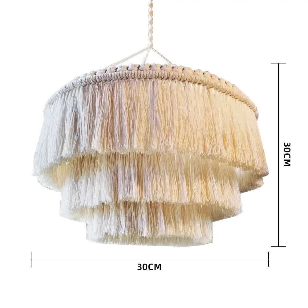 Boho beige macrame pendant light cover with tiered fringe and woven top ideal as a bedroom light cover