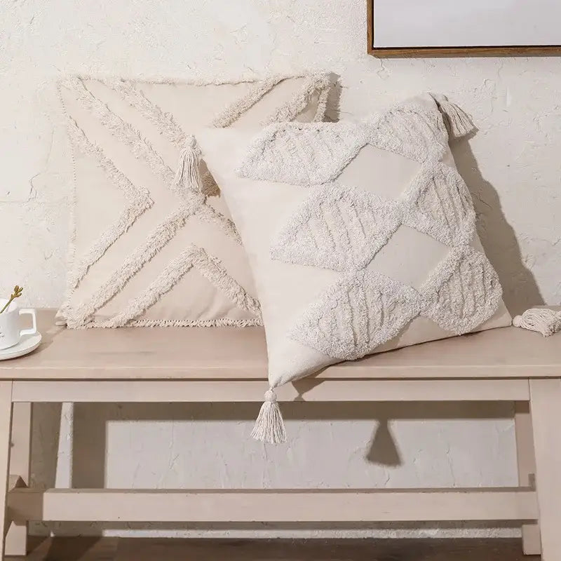 Cream-colored boho beige tasseled cushion cover with textured fringed geometric patterns for living room decorbites beige boho style