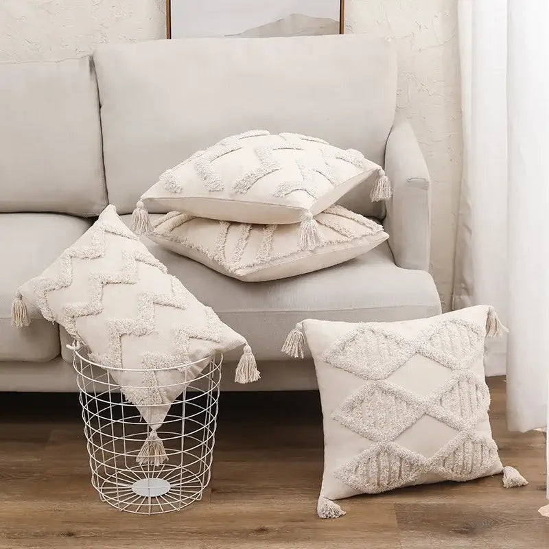Cream-colored cushion cover with textured woven patterns and tassels for decorbites beige boho style living room decor