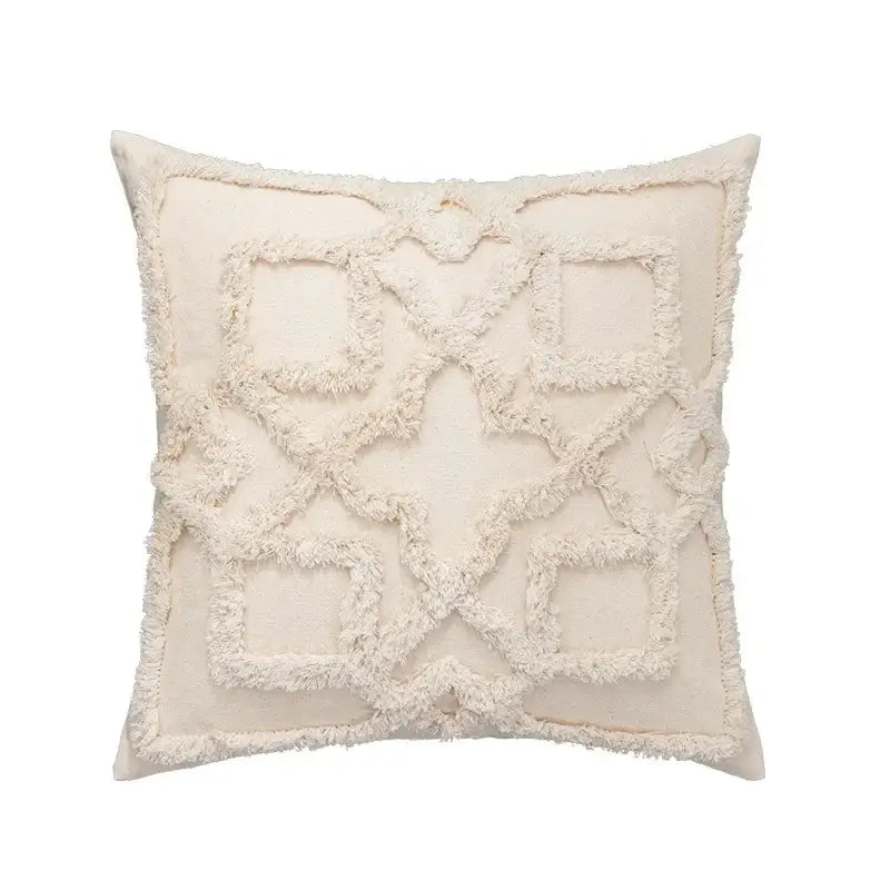Cream-colored cushion cover with textured frayed geometric pattern in decorbites beige boho style for living room decor