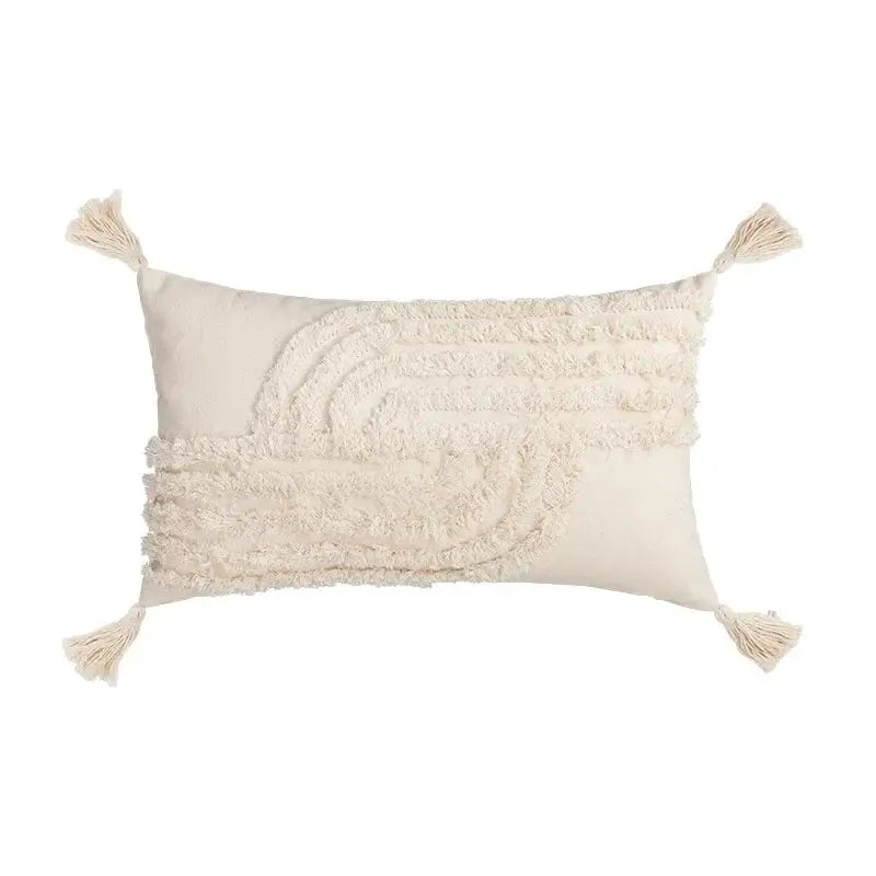 Cream-colored woven cushion cover with textured layered fringe and tasseled corners for decorbites beige boho style decor