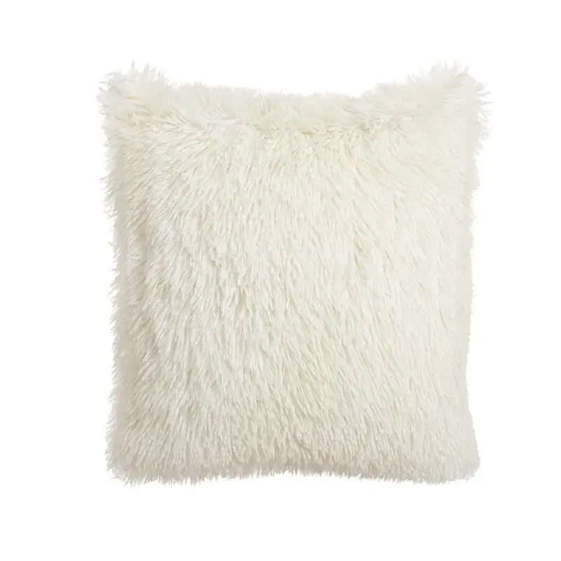 Cream-colored plush faux fur cushion cover with soft shaggy texture and tufted fringed edges for boho decorbites beige tufted style