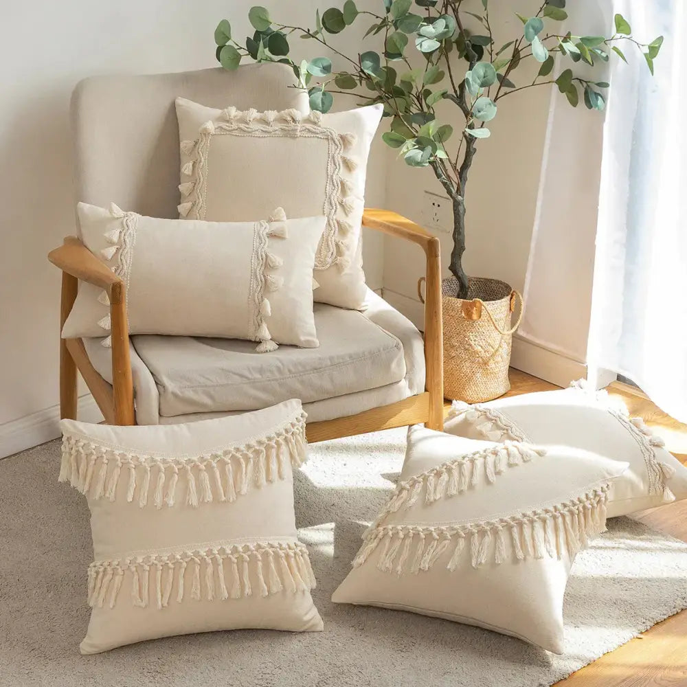 Cream-colored boho beige tufted fringed cushion cover with macrame tassels and fringe detailing for living room decor