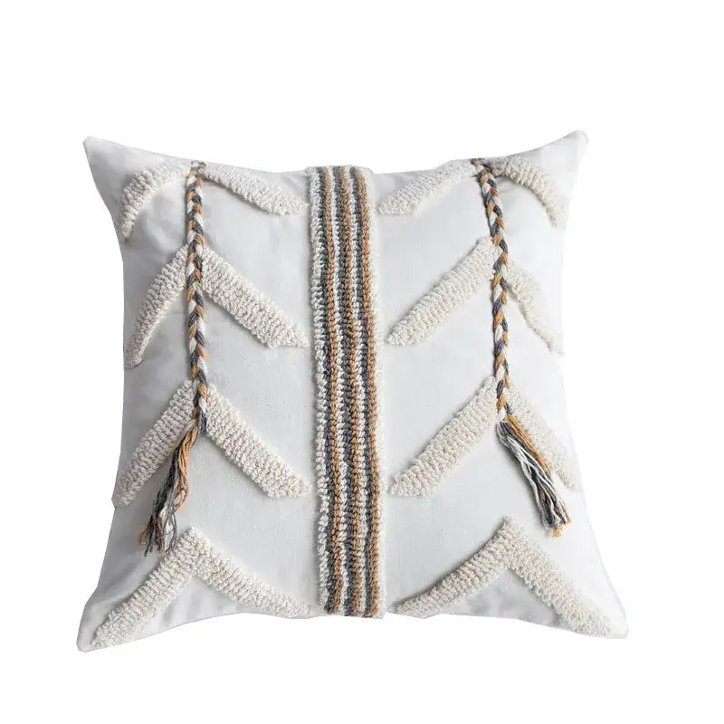 White throw tufted pillow cover with beige and gray woven arrow patterns for boho living room decor