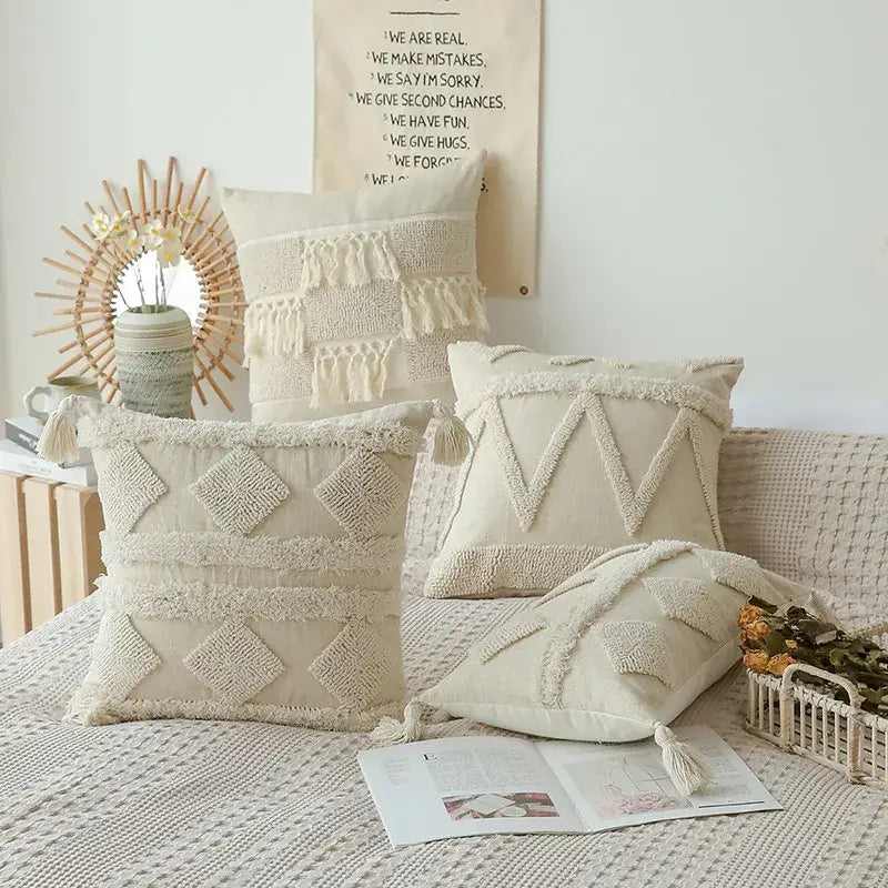 Cream-colored boho beige white tufted throw pillow covers with woven geometric patterns and tassels for bedroom decorbites boho beige