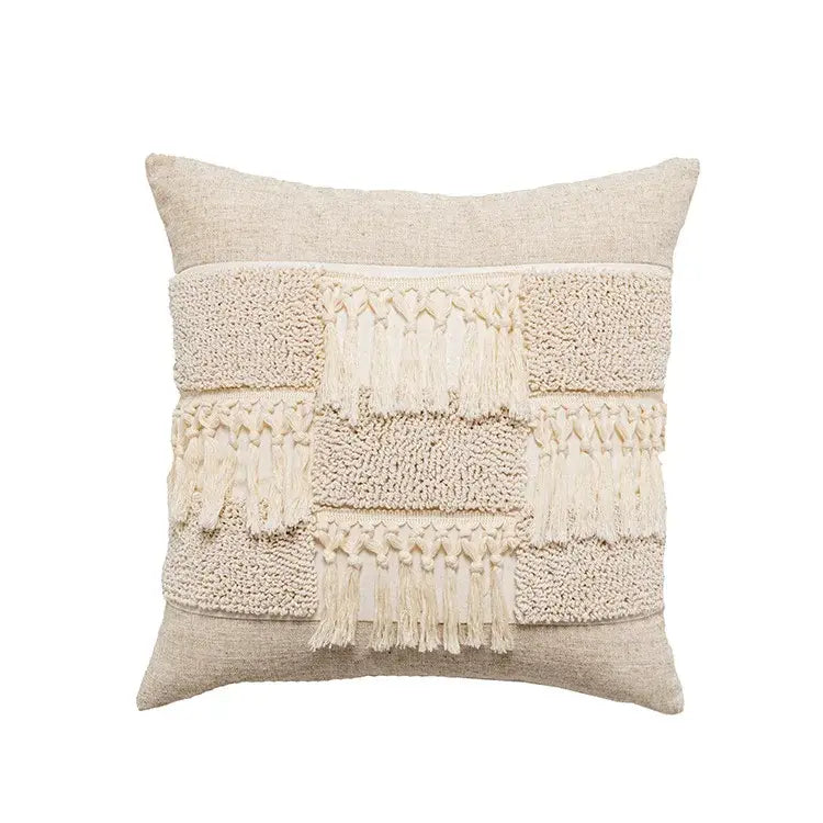 Beige textured throw pillow with layered woven panels and fringe detailing for boho beige white tufted decorbites bedroom decor