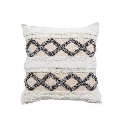 Beige throw pillow with textured white and black woven geometric patterns for decorbites boho beige white tufted decor