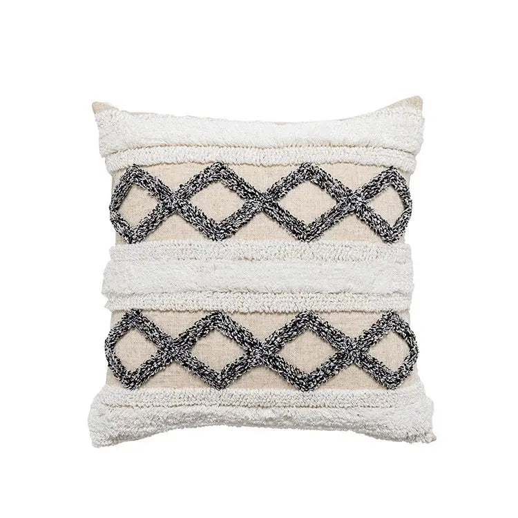 Beige throw pillow with textured white and black woven geometric patterns for decorbites boho beige white tufted decor