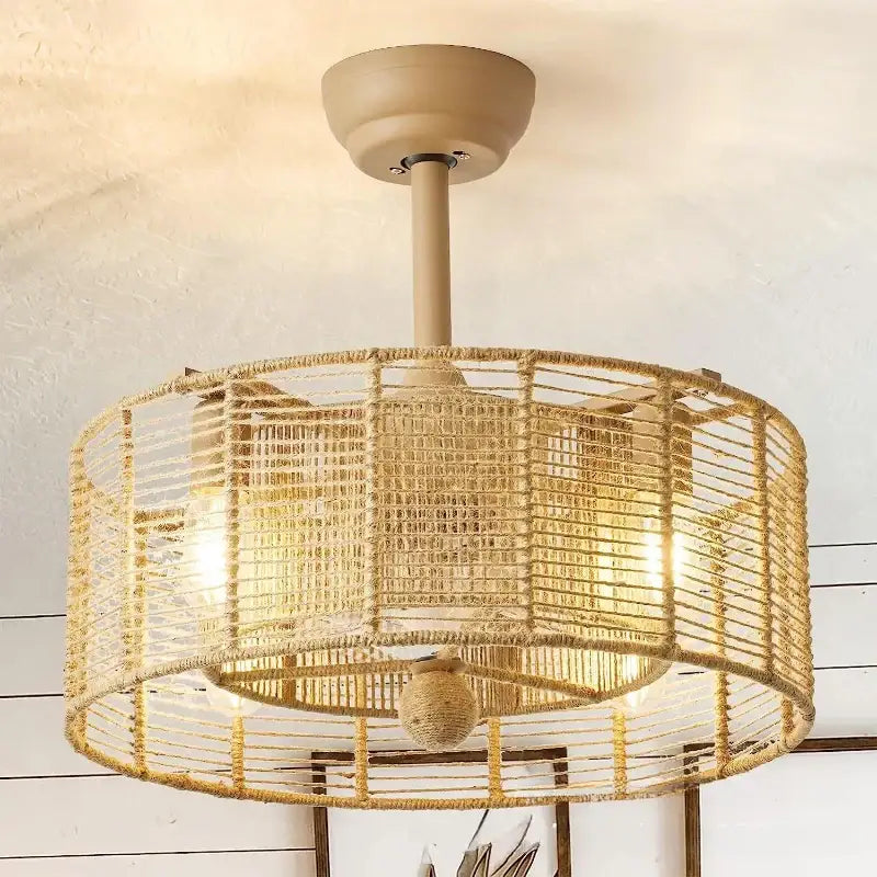 Boho beige woven rattan ceiling fan light with cylindrical cage design and warm glowing bulbs for living room