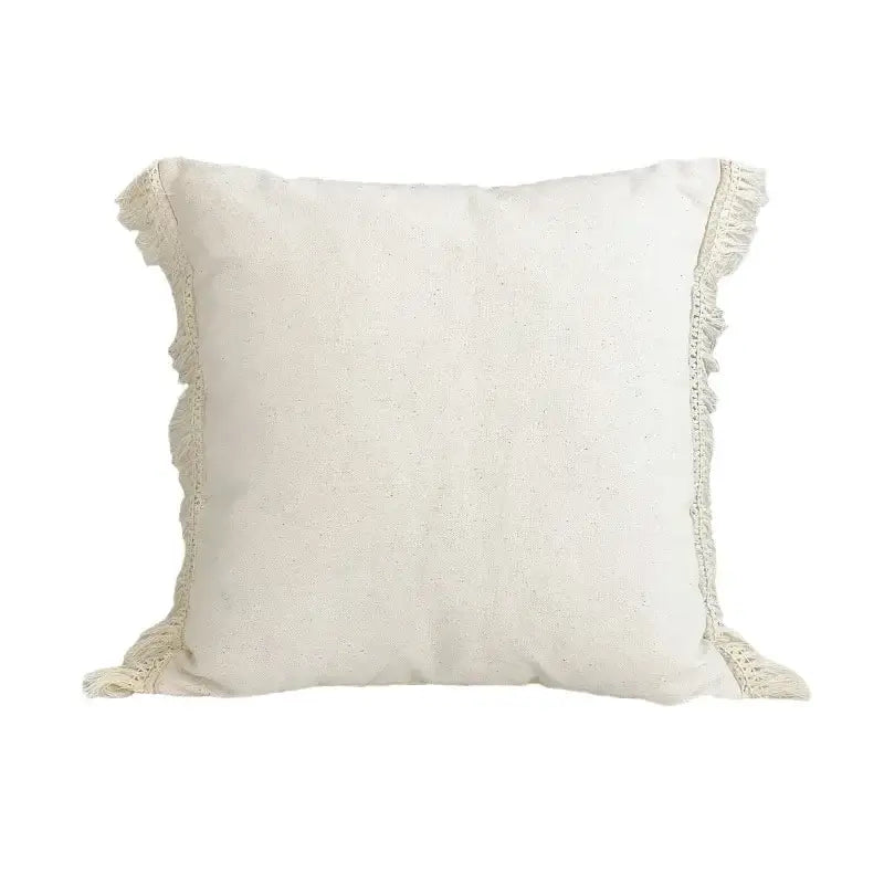 Cream-colored linen cotton pillow cover with fringed edges for boho beige and yellow living room decor