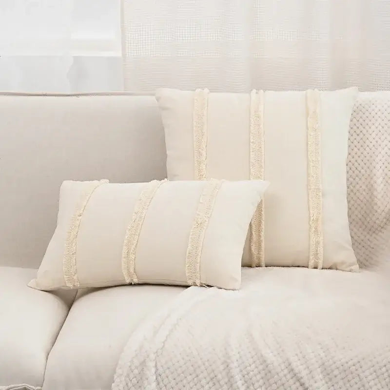 Cream-colored linen cotton pillow covers with textured frayed lace trim for boho living room decor