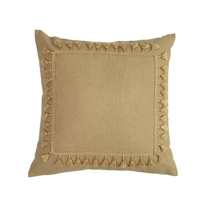 Beige linen cotton pillow cover with decorative tassel border and woven trim for boho living room decor
