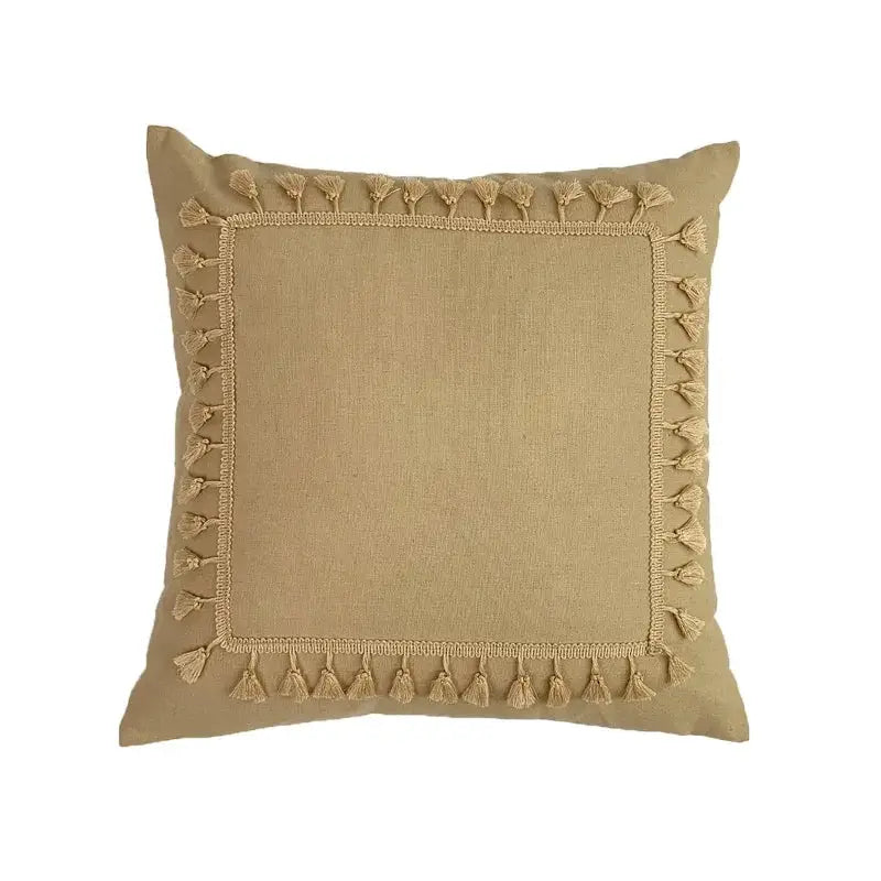 Beige linen cotton pillow cover with decorative tassel border and woven trim for boho living room decor