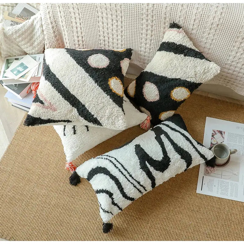 Three plush black-and-white textured boho big eye cushion covers with tassels and geometric patterns for living room decorbites boho big