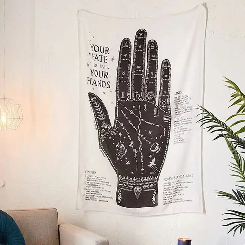 White wall hanging featuring a detailed black handprint with astrological symbols as a boho divination tapestry pink ouija