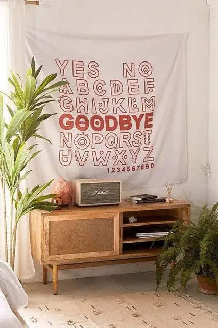 White boho wall hanging divination tapestry pink with red and brown alphabet and ouija style lettering for bedroom decor