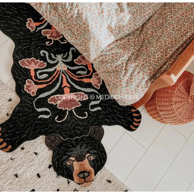 Boho black bear rug featuring intricate floral embroidery in rust cream and muted green tones for bedroom decorbites decor