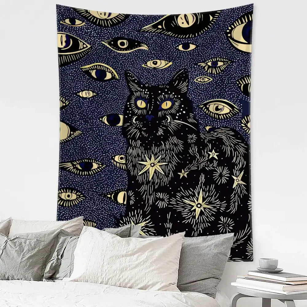 Boho black and gold cat eyes tapestry featuring a dark blue background with a central black cat and celestial decorbites cat eyes design