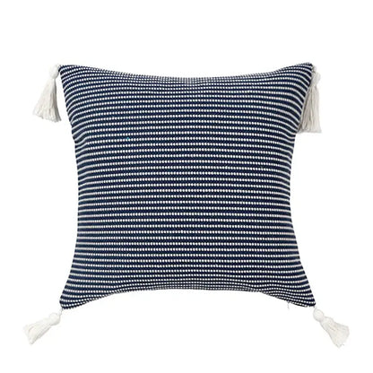Navy blue and white woven pillow case with cream tassels featuring jacquard flower design for decorbites boho jacquard decor