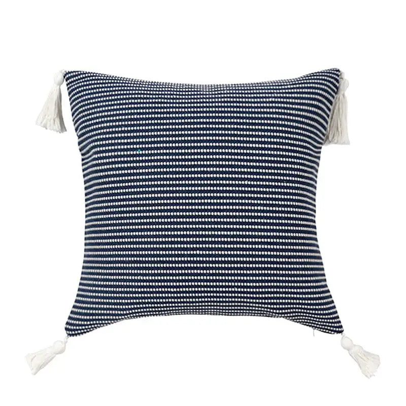Navy blue and white woven pillow case with cream tassels featuring jacquard flower design for decorbites boho jacquard decor