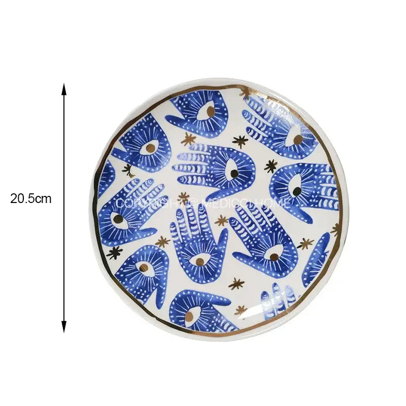 Boho blue and gold bright eyes ceramic dinner plate with white base blue handprints and gold stars rim decorbites bright eyes