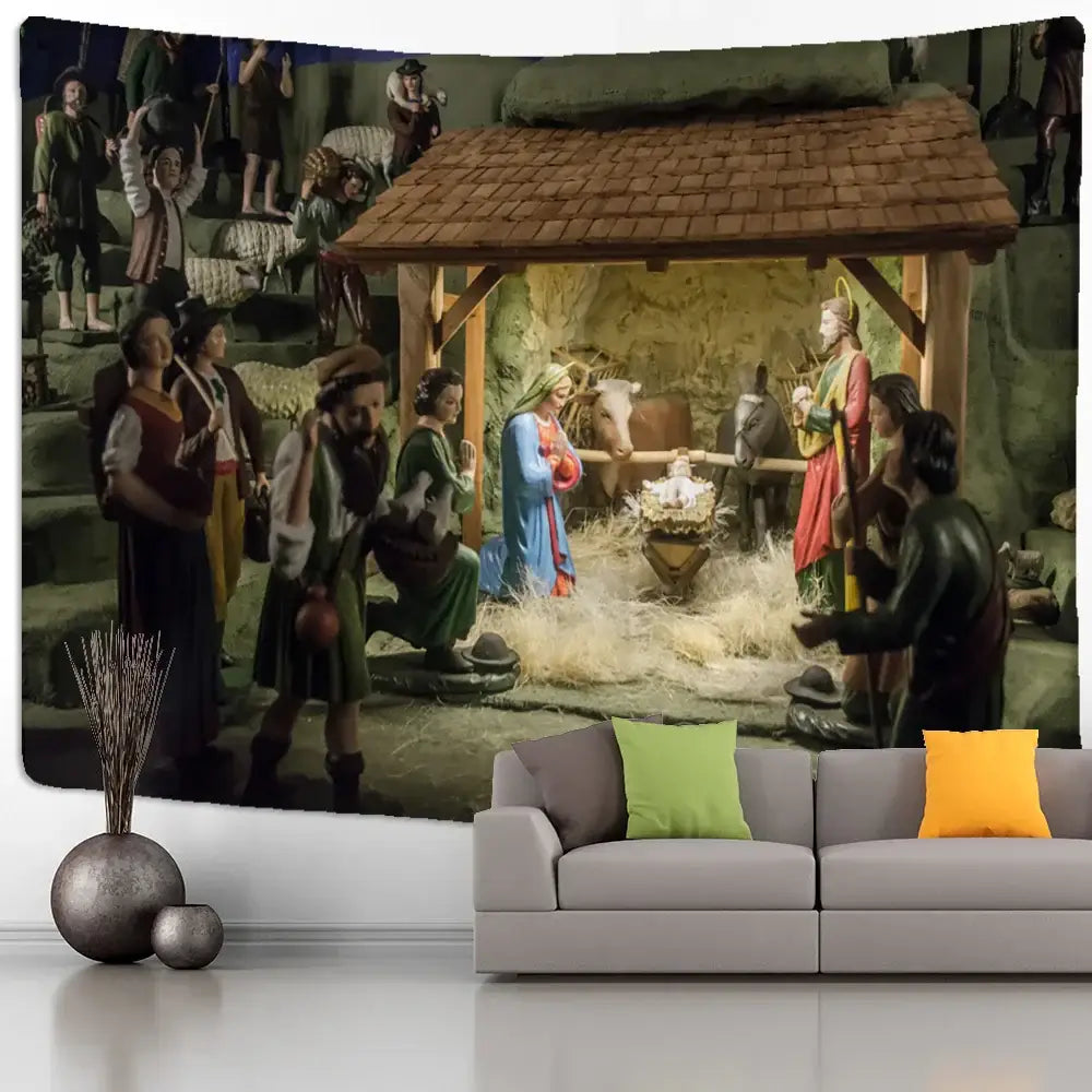 A boho blue camel starlight oil painting tapestry featuring a detailed christmas nativity scene hanging above a gray sofa
