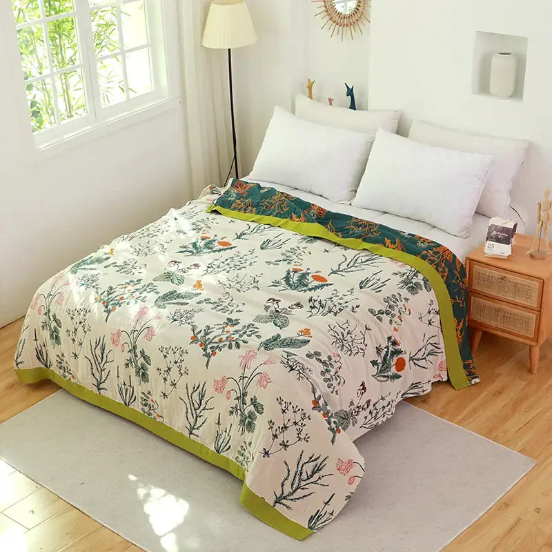 Soft cream cover blanket with vibrant botanical print and lime-green border for sofa chair decorbites boho cotton use