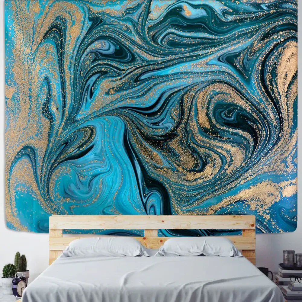 A vibrant blue gouache line marbled wall tapestry with gold swirling patterns and glittery accents for bedroom decor