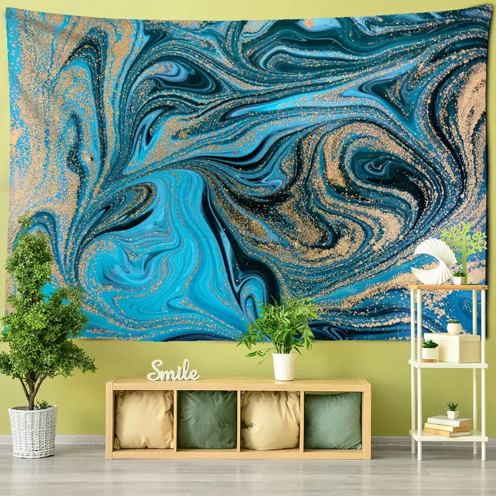 A vibrant blue gouache line marbled tapestry with gold glittery accents hangs as a boho bedroom wall decoration