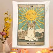 Boho cat divination tarot card tapestry wall hanging features a white fabric with sun card and gray tabby cat design