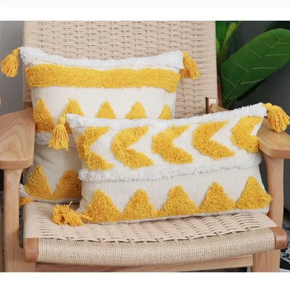 Cream-colored boho chenille tufted pillow case with mustard-yellow tassels and geometric patterns for living room decorbites decor
