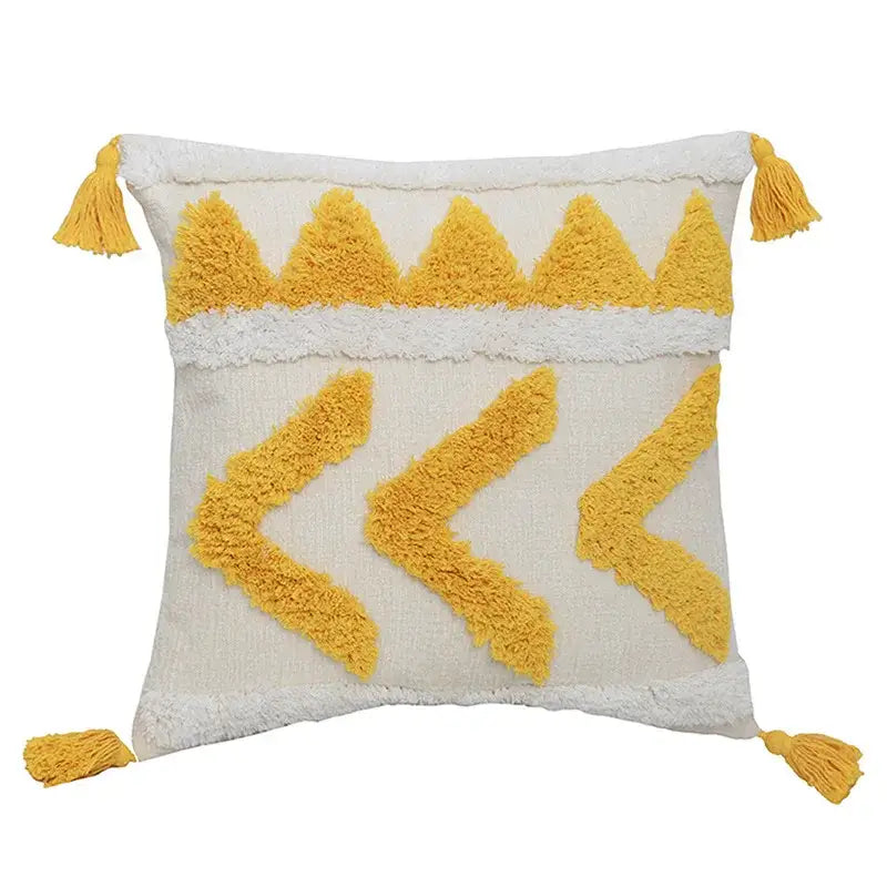 Cream-colored boho chenille tufted pillow case with mustard-yellow geometric patterns and tassels for living room decorbites decor