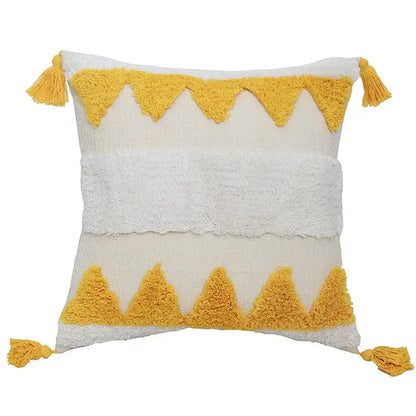 Cream-colored boho chenille tufted pillow case with mustard-yellow triangular tassels for living room decor