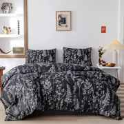 Boho chic black and white botanical bedding set featuring a duvet cover with white illustrations for bedroom decorbites boho chic