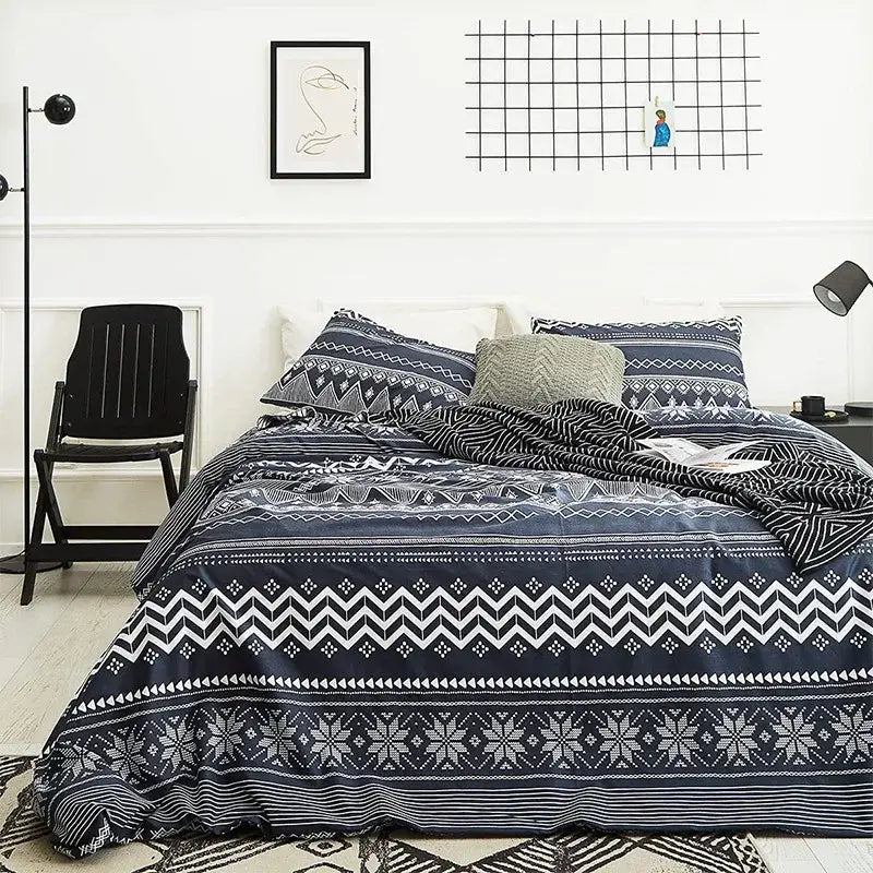 Navy blue and white geometric patterned bedding set with snowflake motifs in decorbites boho chic style duvet cover