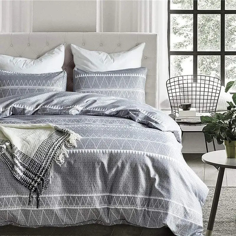 Gray and white geometric-patterned duvet set with textured woven fabric in decorbites boho chic bedding set style