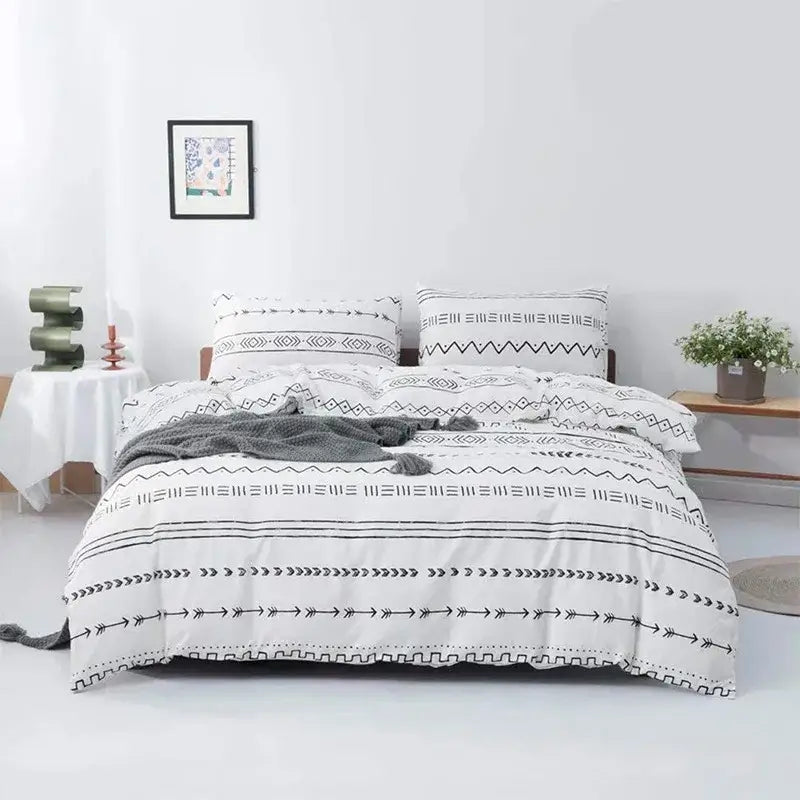 White bedding set with black geometric patterns in decorbites boho chic botanical duvet cover for stylish bedroom decor