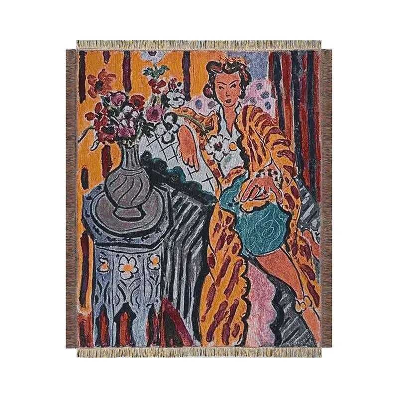 Rectangular woven decorbites boho chic throw blanket with orange and brown stylized woman painting and fringe edges