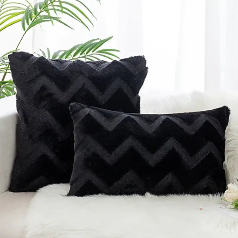 Black fuzzy throw pillow cover with bold zigzag pattern made of plush faux fur for decorbites boho chic bedroom decor