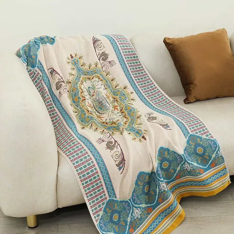 Luxurious cream silk scarf with teal gold brown floral embroidery paired with decorbites boho cotton gauze bath towel