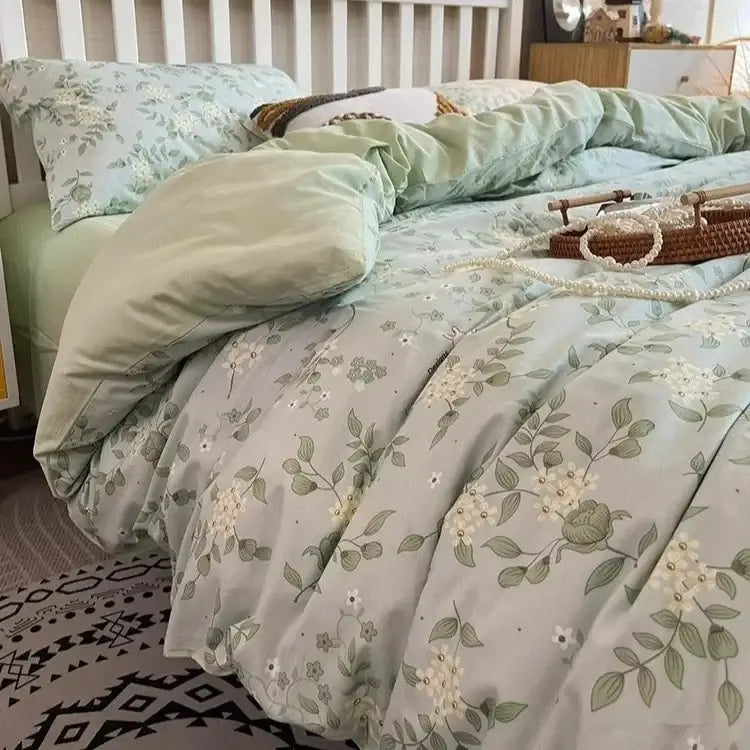 Light green boho cotton printed duvet set with delicate white and olive leaf patterns from decorbites bedding set