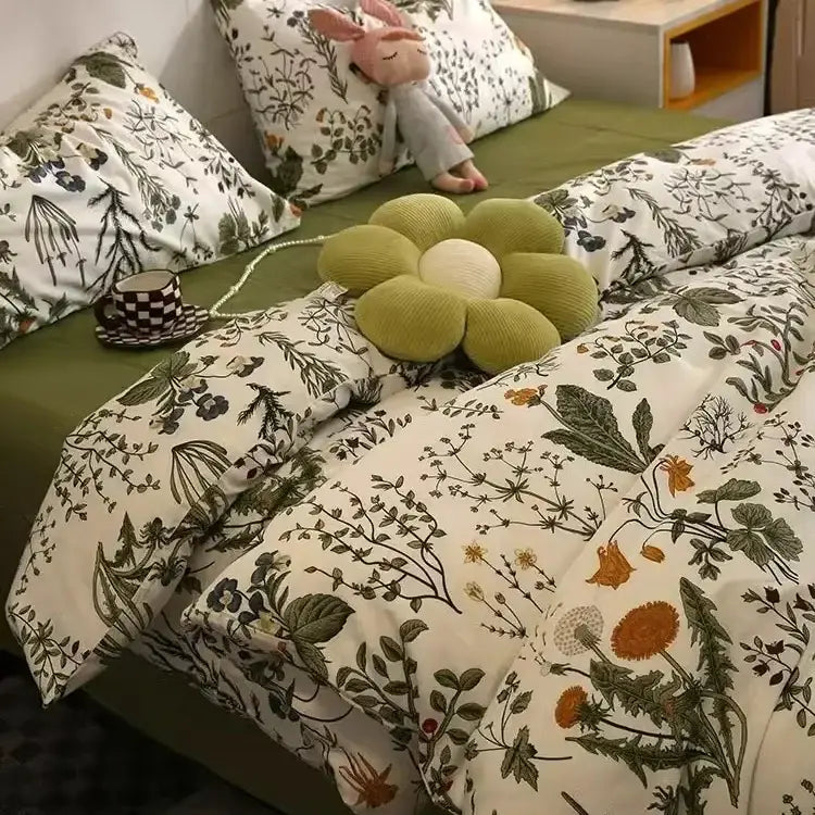 Green corduroy flower-shaped pillow with cream center complementing boho cotton printed cream floral bedding set decorbites