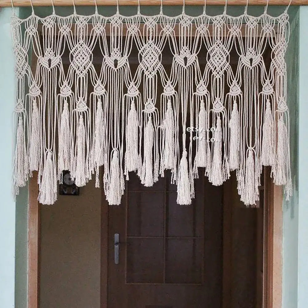 Cream-colored boho cotton wove door curtain with intricate macrame knotwork and tassels for bedroom decorbites decor