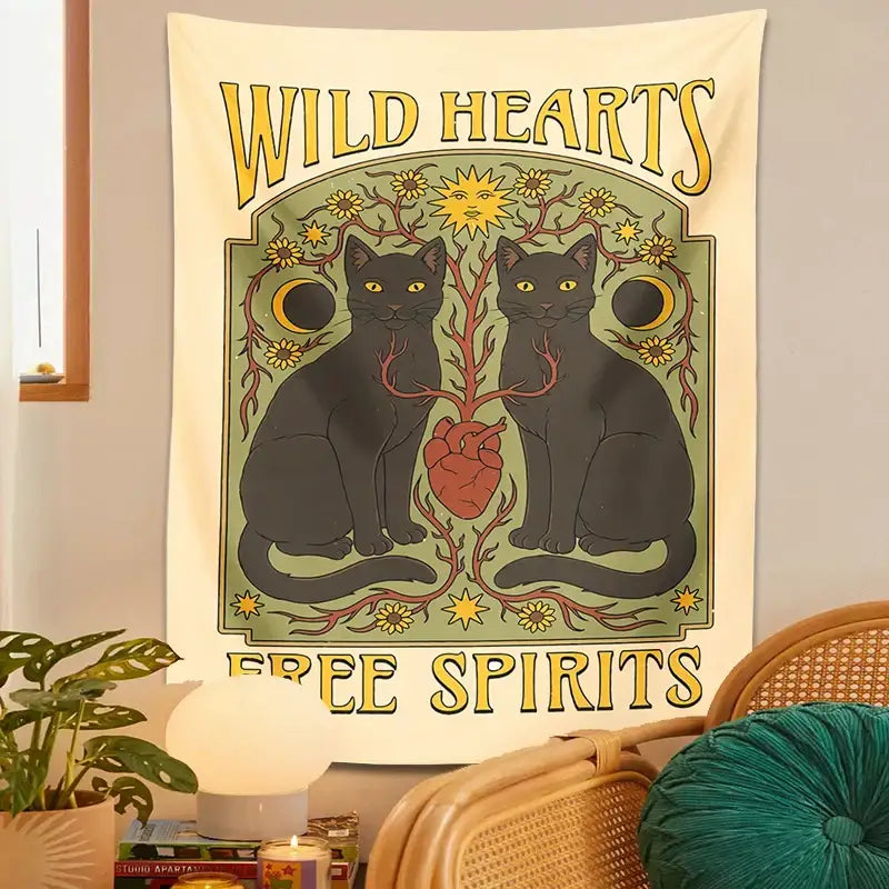 A cream boho cat hearts tapestry wall hanging featuring two black cats yellow eyes and decorative suns and moons for decorbites cat hearts