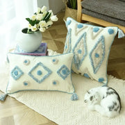 Cream-colored rectangular and square cushion covers with boho blue diamond embroidery and tassels for living room decorbites boho blue decor