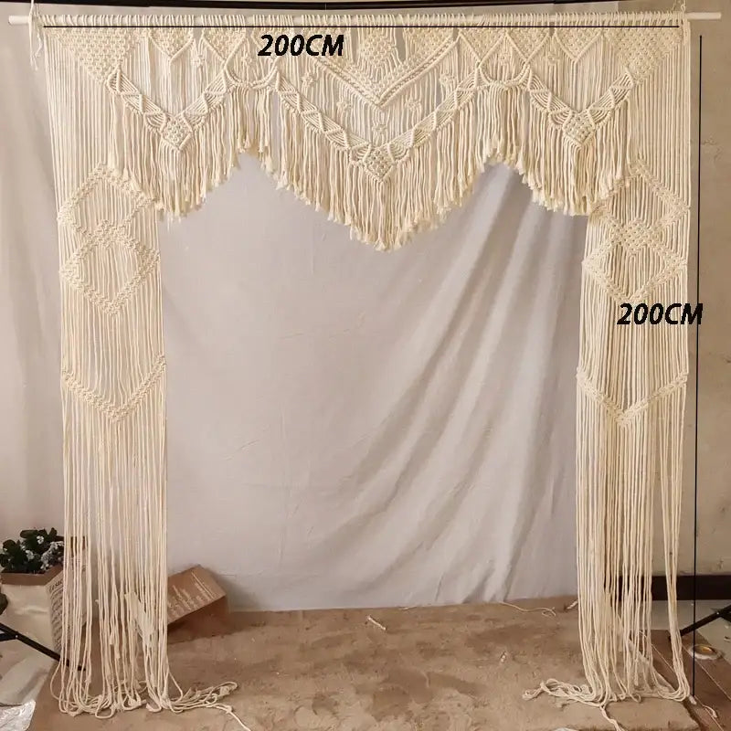 Boho cream cotton macrame wedding backdrop with intricate geometric patterns and long fringe for living room decorbites decor