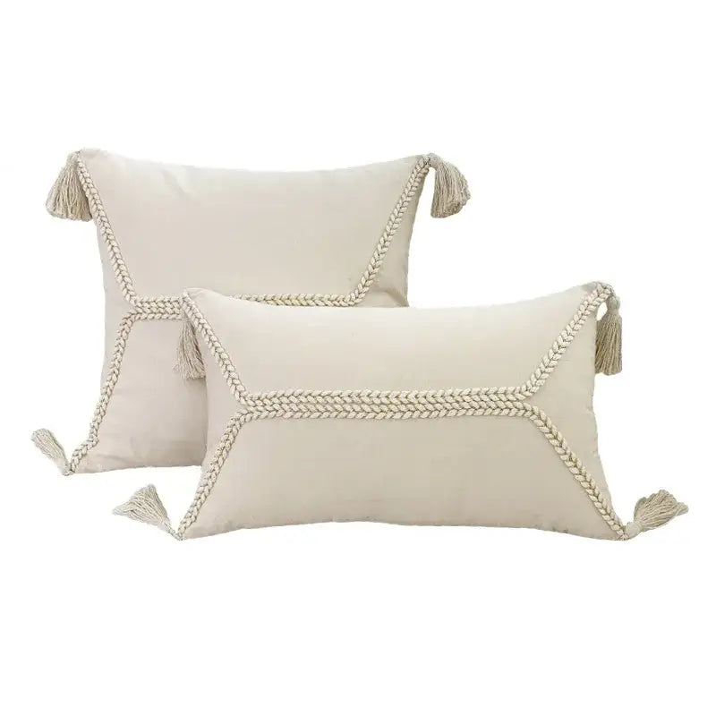 Cream-colored rectangular cushion cover with lace floral design braided rope trim and tassels for decorbites boho white decor